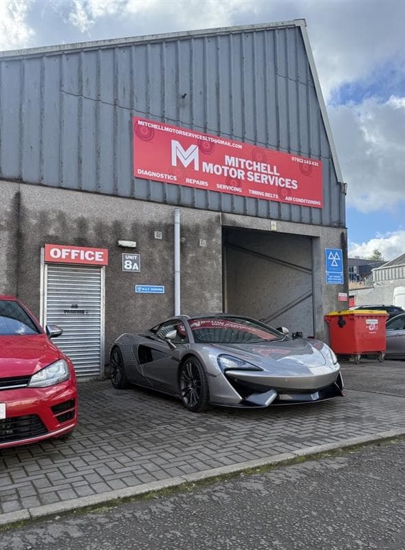 Mechanic working on a car
